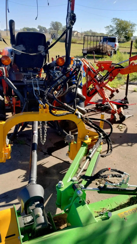 Manual 6 Port Tractor Remote Diverter Valve Converts One Remote Into Two Inlets And Four Outlets installed on farm equipment