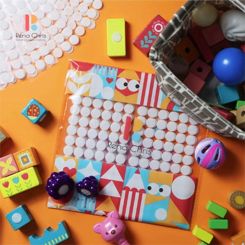 Hook And Loop Dots Set 500 Pairs 0.59 Inch Nylon Self Adhesive For Classrooms shown with toys on orange surface