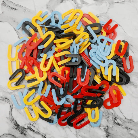 Must-Have Plastic Shims Set 200 Pcs Horseshoe Spacers U Shims For Leveling In Black 1/4 Inch Yellow 3/16 Inch Red 1/8 Inch Blue 1/16 Inch Durable PP Material, 4 Colors, 50 Pcs Each displayed on a surface.