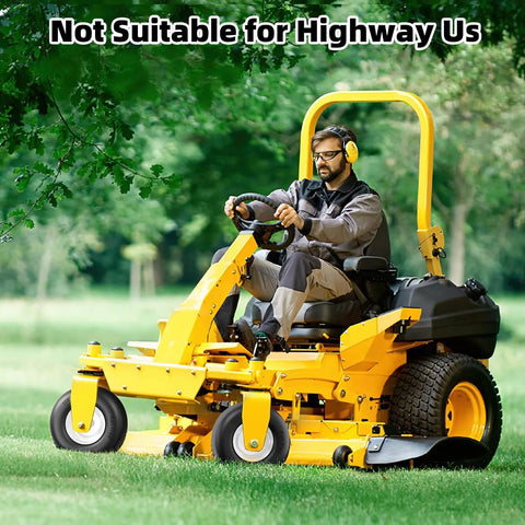 Person mowing lawn with zero turn mower, featuring Flat Free 11x4.00-5 Lawn Mower Tire And Wheel Set, solid polyurethane tires.