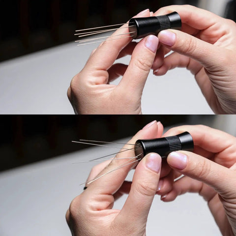 Hands holding Magnetic WDT Tool For Espresso Puck Prep With 120 Degree Adjustable Angle Includes 0.25mm And 0.40mm Needles