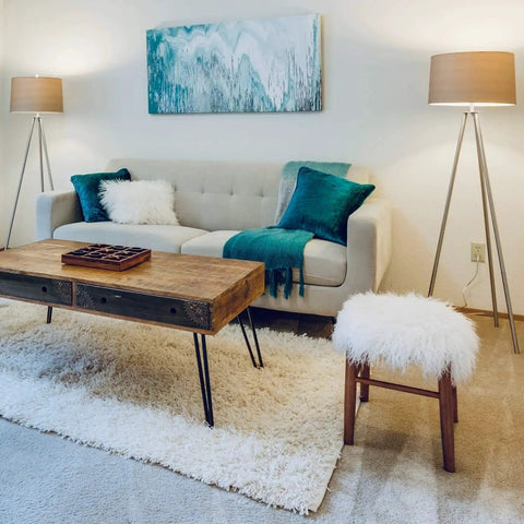 Living room with modern furniture, two standing lamps illuminating a soft white rug, ideal for using LED A19 Light Bulbs 9W 60 Watt Equivalent Dimmable Soft White 2700K E26 Base Energy Efficient Long Lasting 10000 Hour Lifespan 6 Pack Ideal For Ceiling Fixtures And Lamps And Living Areas Mercury Free Instant On