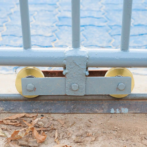 Solid 4 Inch V Groove Gate Wheel Set Heavy Duty Sliding Gate Rollers One And Three Quarters Inches Width Caster Wheels with gate installed