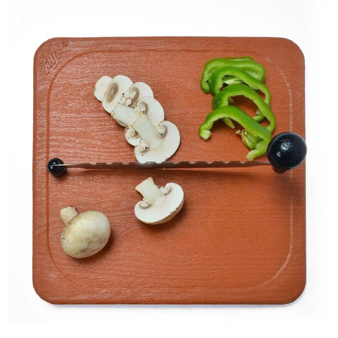 Fantastique Deluxe Stainless Steel Vegetable Cutter With Two Sided Razor Sharp Blades And Magnetic Construction Polypropylene Board With Nylon Handle No Finger Cut Safe Fast Veggie And Fruit Slicing By Anjali in use slicing mushrooms and peppers.