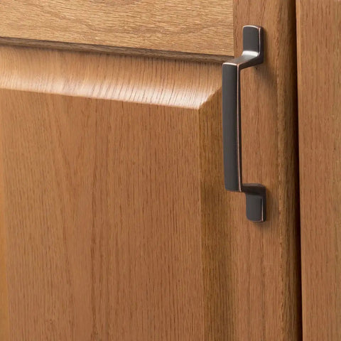 Solid Core Cabinet Pulls for Kitchen and Dresser Doors Richmond Collection Oil Rubbed Bronze Highlighted Bar Pulls With Three Inch Center To Center Four And Nine Sixteenths Inches Long Luxury Hardware For Contemporary And Traditional Includes Mounting installed on wooden cabinet door
