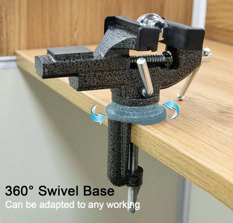 Versatile 3 Inch Universal Table Vise Clamp On Portable Bench Clamp With 360 Degree Swivel Base attached to wooden table