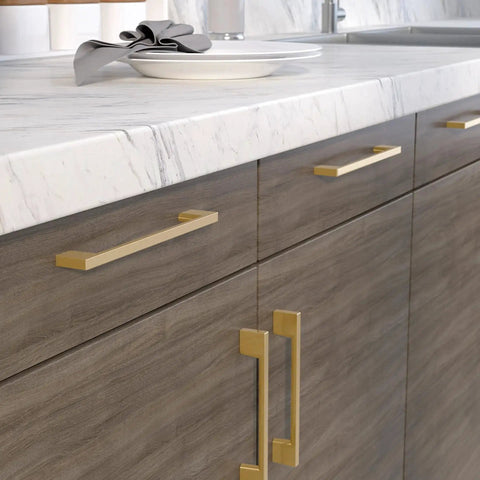 Armadale Collection Champagne Bronze Modern Rectangular Cabinet And Drawer Pull Handle in kitchen setting, 6 5/16" center to center.