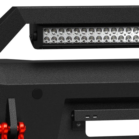 Close-up of Ram 2500 3500 front bumper with LED lights, winch plate, and D rings, showcasing textured black steel finish.