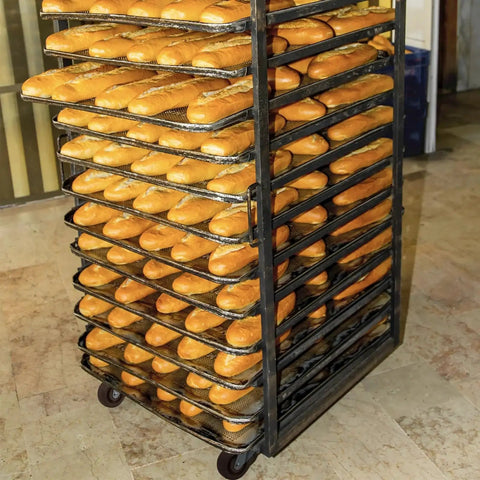 Rack with bread loaves on Heavy Duty Swivel Caster Wheels 4 Inch By 1.5 Inch Set Of 4 With 2800 Lb Capacity for ovens