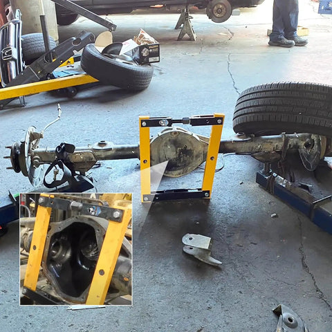 Differential Housing Case Spreader For Dana 30, 44, 60, 70 And 80 Series with axle on floor, showing heavy duty steel construction