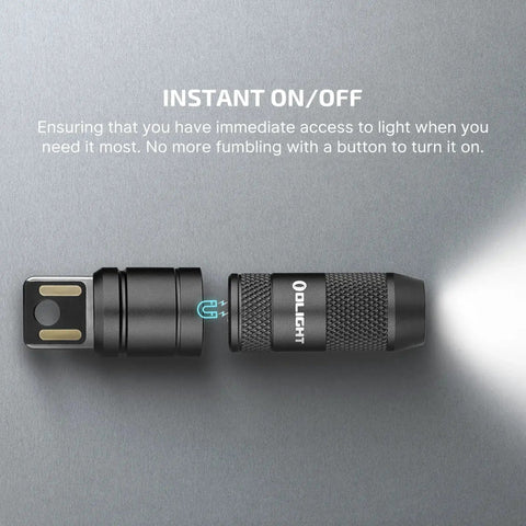 Imini 2 EDC Rechargeable Keychain Flashlight With 50 Lumens Output showing magnetic cap and LED light emitting beam