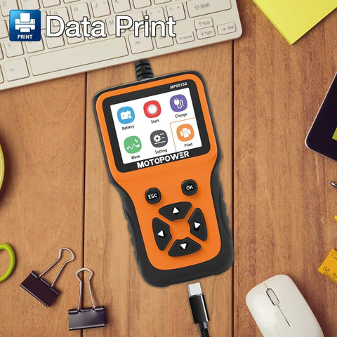 12V Car Battery Tester That Quickly Reads Battery Health And Alternator Output, A Must Have Auto Tool For Quick Diagnoses In Your Garage Or On The Road, front view on a workspace.