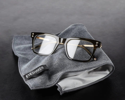 Premium Microfiber Glass Cleaning Cloth 30x20 Cm for Glasses Phone Screens with black glasses on grey cloth, close-up view.