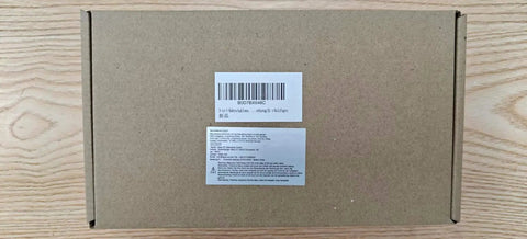 Brown packaging box labeled for Pro Grade Pocket Hole Jig Kit With Metal Construction And Adjustable Drill Guides For 15 Degree Holes.
