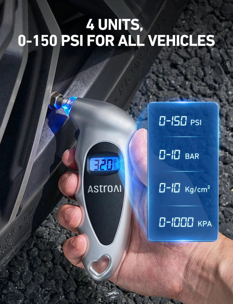 AstroAI digital tire pressure gauge in silver with blue backlit LCD displaying 32.0 PSI.