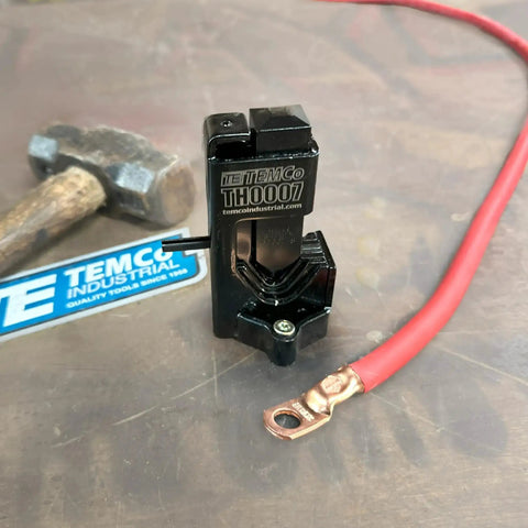 Hammer Lug Crimper Tool For Battery And Welding Cables Crimps 8 AWG Through 4/0, hammer and cable on bench