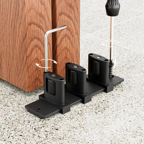 Sliding Closet Door Floor Guide With Adjustable Bottom Guide And 3 Roller System in Black Finish installed next to door