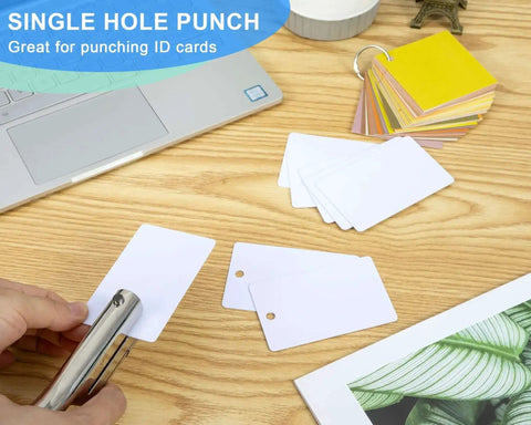 Heavy Duty One Quarter Inch Single Hole Punch For Crafts And Office Use on desk punching ID cards