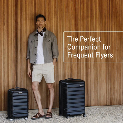 Man standing with Omni 2 24 Inch Medium Checked Hardside Luggage With 360 Degree Spinner Wheels By Samsonite, black variant
