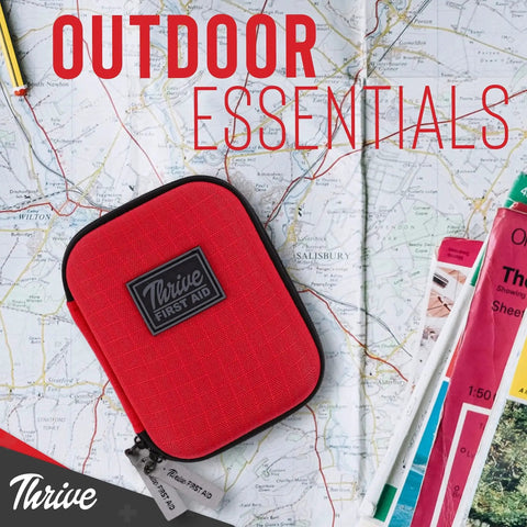 Mini First Aid Kit For Travel And Adventure By Thrive on map, red waterproof shell with 66 pieces for emergencies.