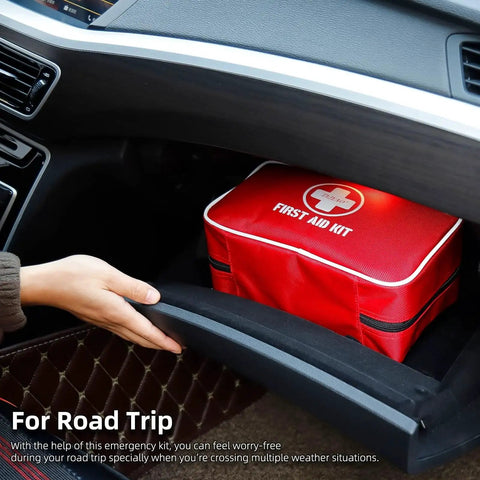 330 Piece First Aid Kit Premium Waterproof Compact Trauma Medical Kit stored in car compartment for emergency needs