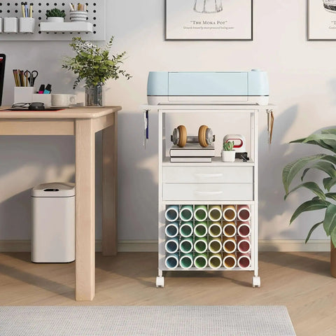 Ultimate Cricut Organizer and rolling storage cart with 24 vinyl roll holders, two fabric drawers, tool hook, white color.
