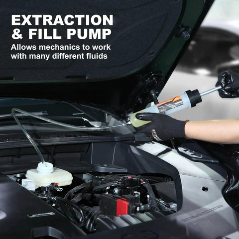 Mechanic using 200cc Fluid Extractor And Fill Pump For Automotive Use With 23 Inch Reach Hose in car engine bay