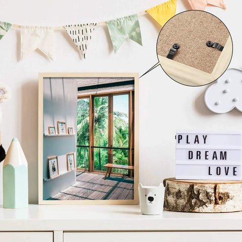 Wooden photo frame on shelf with diagram showing metal picture frame turn button fasteners with screws set for hanging.