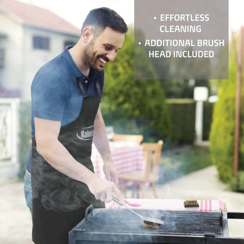 Man grilling with 21 Piece Heavy Duty Stainless Steel BBQ Tool Set With Apron And Aluminum Case at a backyard cookout.