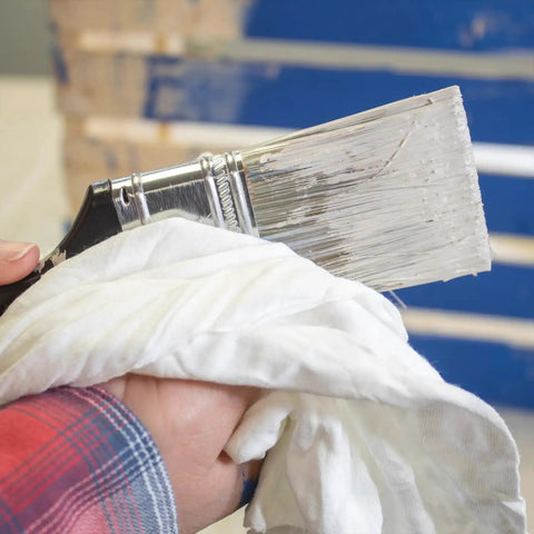 White cotton cleaning rag with paintbrush for staining and painting, from White Cotton Cleaning Rags 25 Lb Box For Cleaning Staining Painting Oil And Grease Removal Multipurpose Shop Rags For Grime Busting Dusting Polishing Woodwork Spills And Delicate Tasks