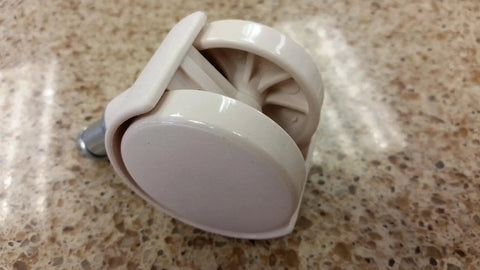 Almond Replacement Caster Set For Chromcraft Chairs with 1-3/4 inch Polyurethane Wheel on a marble surface, 360 degree swivel