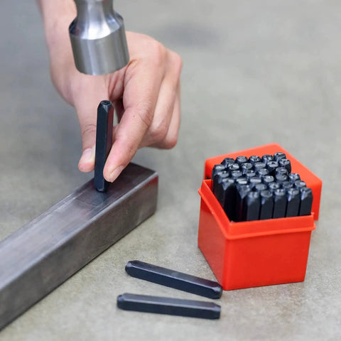 Hand using Number And Letter Punch Set With Heat Treated Steel Punches For Imprinting And Arts And Crafts For Hobbyists One Quarter Inch Shaft