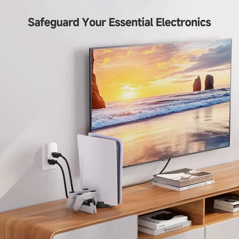 1350 Joules Single Outlet Surge Protector For TV PC Xbox PS5 Refrigerator And More 15A 1875W Wall Surge Protector With 500V Clamping Voltage ETL Listed White Gamer Ready, wall-mounted near TV and gaming console.
