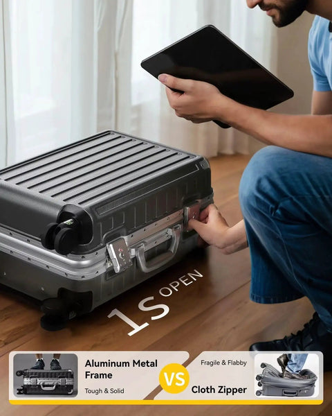 Person using tablet next to Carry On Luggage With Spinner Wheels 8010S Aluminum Frame Zipperless Polycarbonate Hard Shell Suitcase on wooden floor