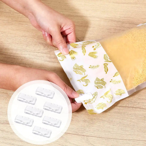 Woman using 30 Piece Vacuum Storage Bags Sealing Clip Reusable Zipper Labor Saver Sliding Grip for airtight food preservation in kitchen