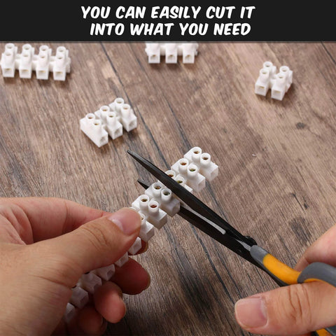 Person cutting 12-Position Dual Row White Screw Terminal Block Set 10 A 380 V Wire Connector Electrical Barrier Block