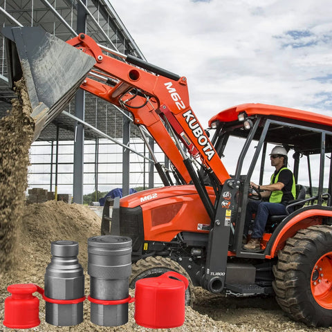 3/4-inch SAE skid-steer flat-face hydraulic quick-connect couplers with dust caps, gray metal, Kubota M62 loader visible.