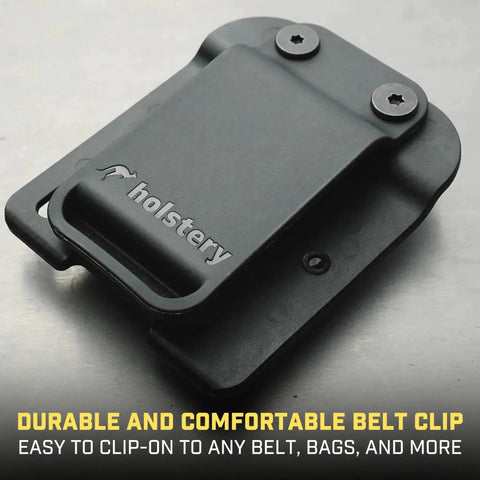 Magnetic Tool Holder Clip On Belt Holster displayed on metal surface with visible belt clip and screws