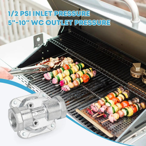 Gas Pressure Regulator For Liquefied Propane And Natural Gas With Five Inch Water Column Natural Gas Outlet And Ten Inch Water Column Propane Outlet, shown next to outdoor grill.