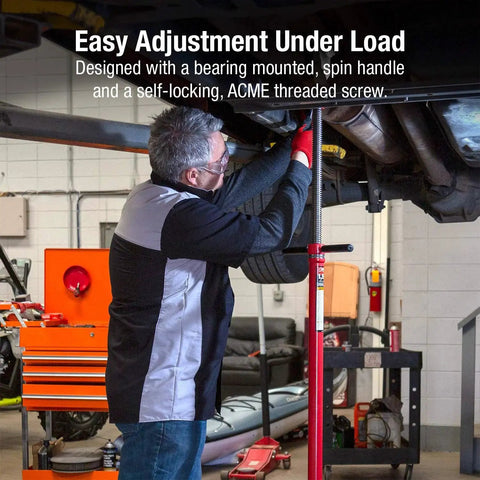Mechanic using Underhoist Vehicle Component Support Stand For Auto Shop Use Three Quarter Ton Capacity 12 Inch Base