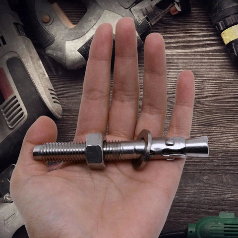 Person holding 304 Stainless Steel Concrete Anchors Wedge Anchor Fasteners One Half Inch By Four Inch Pack Of 10 Heavy Duty