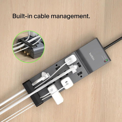 Dope 12 Outlet Surge Protector Power Strip With 8 Foot Flat Plug For Home Office Travel UL Listed Heavy Duty Extension Cord 3940 Joules Of Protection And Charge Multiple Devices At Once, with built-in cable management, on wooden surface.