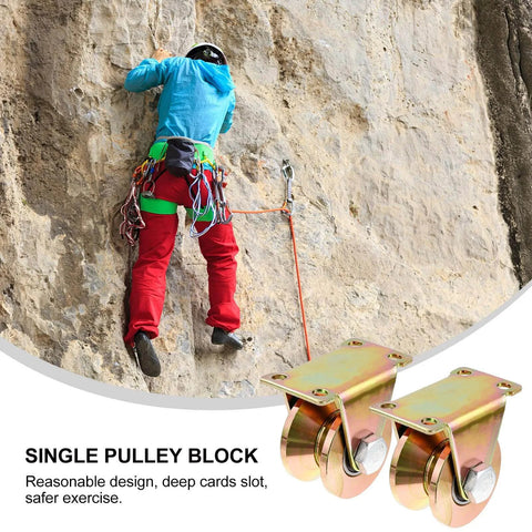 Heavy Duty Steel Pulley Block With V Type Grooved Wheel For Sliding Gates And Rail Tracks Two Pack Built Tough Single Wheel Pulley Block For Industrial Sliding Door Hardware, shown with rock climber in background.