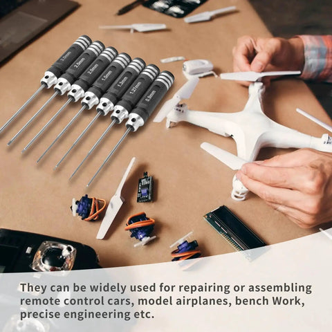 Pro Grade 7 Piece Precision RC Hex Screwdriver Set with high speed steel tips for RC cars and drones repair, shown in workshop.