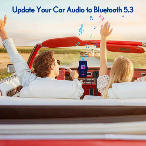 Couple in convertible using Bluetooth Car Kit With Wireless Aux Receiver For Hands Free Calling And Music Streaming Ground Loop Noise Filter