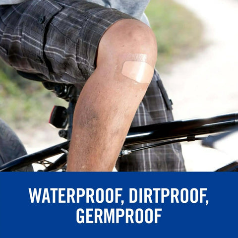Waterproof Clear Bandage on cyclist's knee, 360-degree seal protects minor wounds from water, dirt, and germs in outdoor conditions.