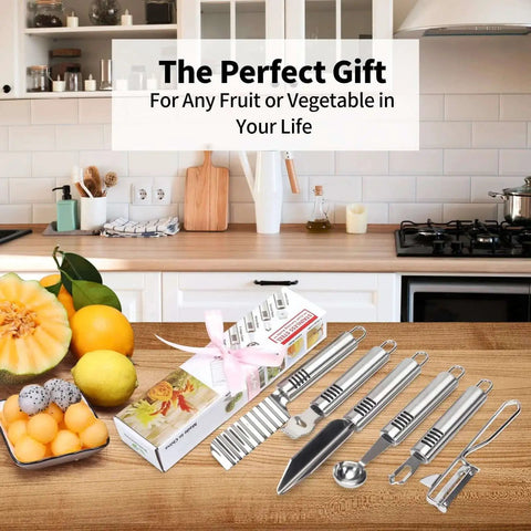 Six Piece Stainless Steel Fruit Carving Knife Set With Melon Ball Scoop V Shape Cutter Lemon Zester Garnish Peeler Crinkle Knife And Wave Knife For Fruit Platters And Vegetable Salads displayed on a kitchen counter with fruits.