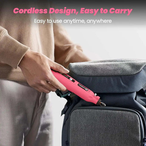 Person placing pink Mini Cordless Rotary Tool Kit With 69 Accessories, 5 Speed 5000 8000 11000 14000 18000 RPM into backpack