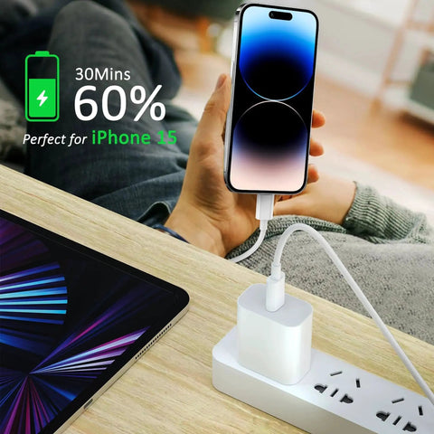 Apple USB C To USB C Cable 2 Pack 10ft Fast Charge 60W For iPhone 16 17 Pro charging a phone next to laptop