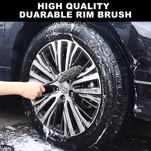 Person cleaning car wheel using All In One Car Wheel Cleaning Kit With Long Handle Brushes, Tire Brush, Soft Microfiber Brush.